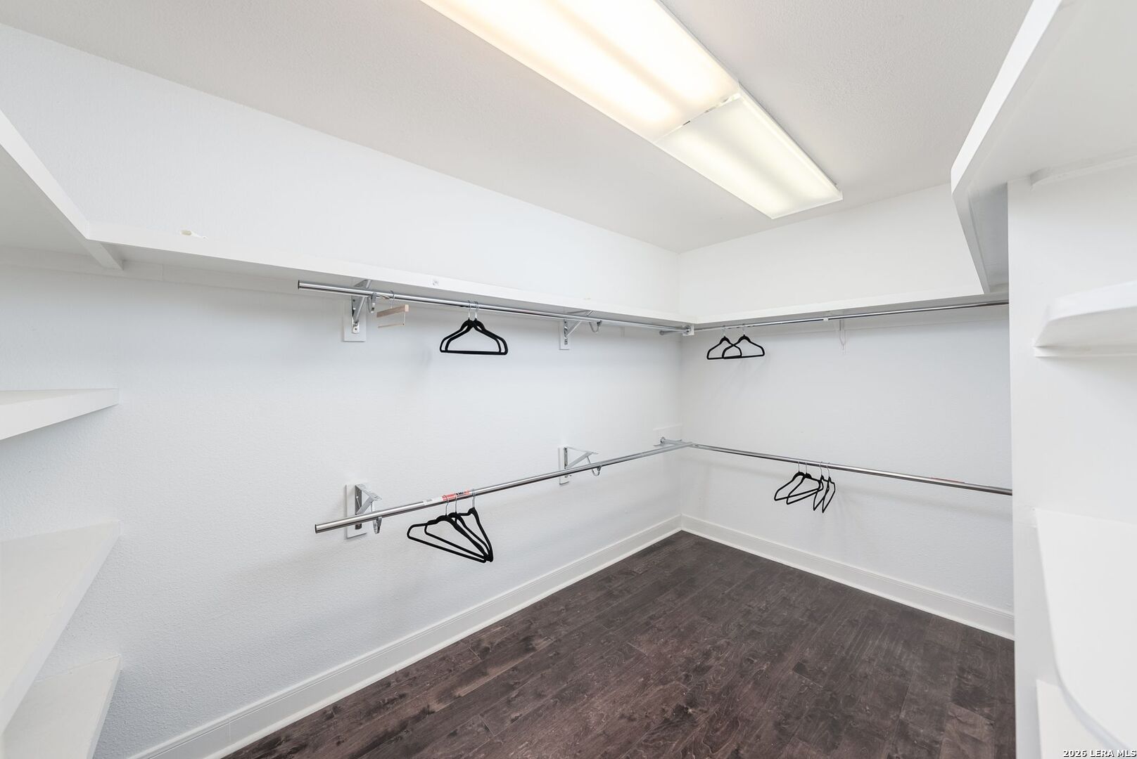 7701 Wurzbach Road, Unit 2302 San Antonio, TX 78229 - Photo 20 of 49 a view of a room with racks on the wall