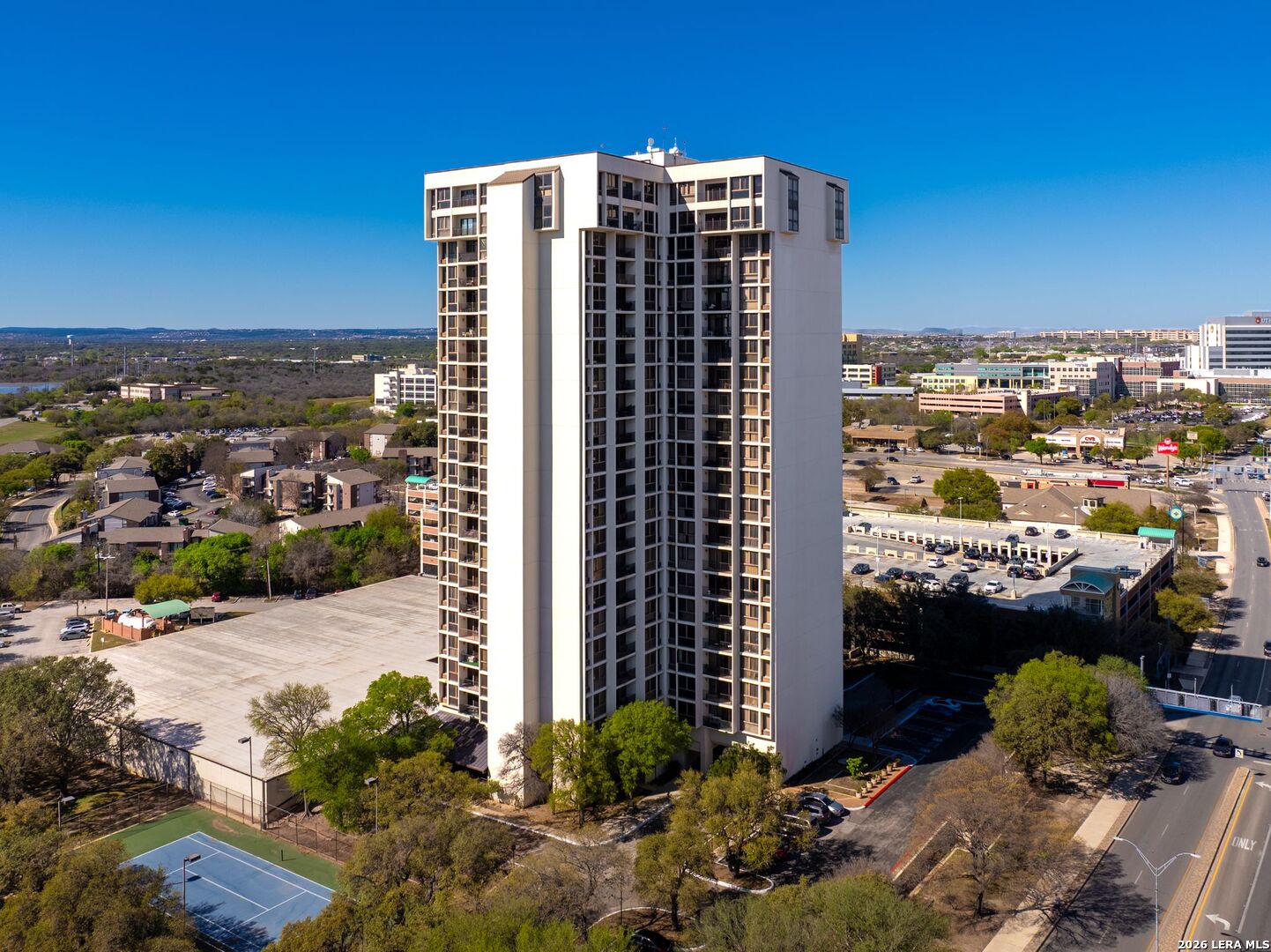 7701 Wurzbach Road, Unit 2302 San Antonio, TX 78229 - Photo 26 of 49 a view of balcony with yard
