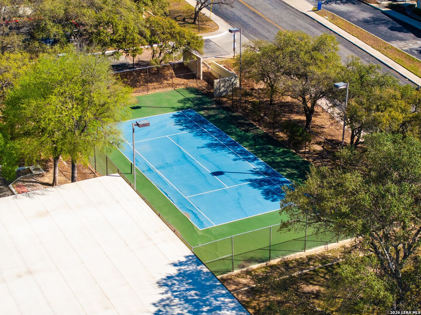 7701 Wurzbach Road, Unit 2302 San Antonio, TX 78229 - Photo 32 of 49 a view of a yard with an outdoor space