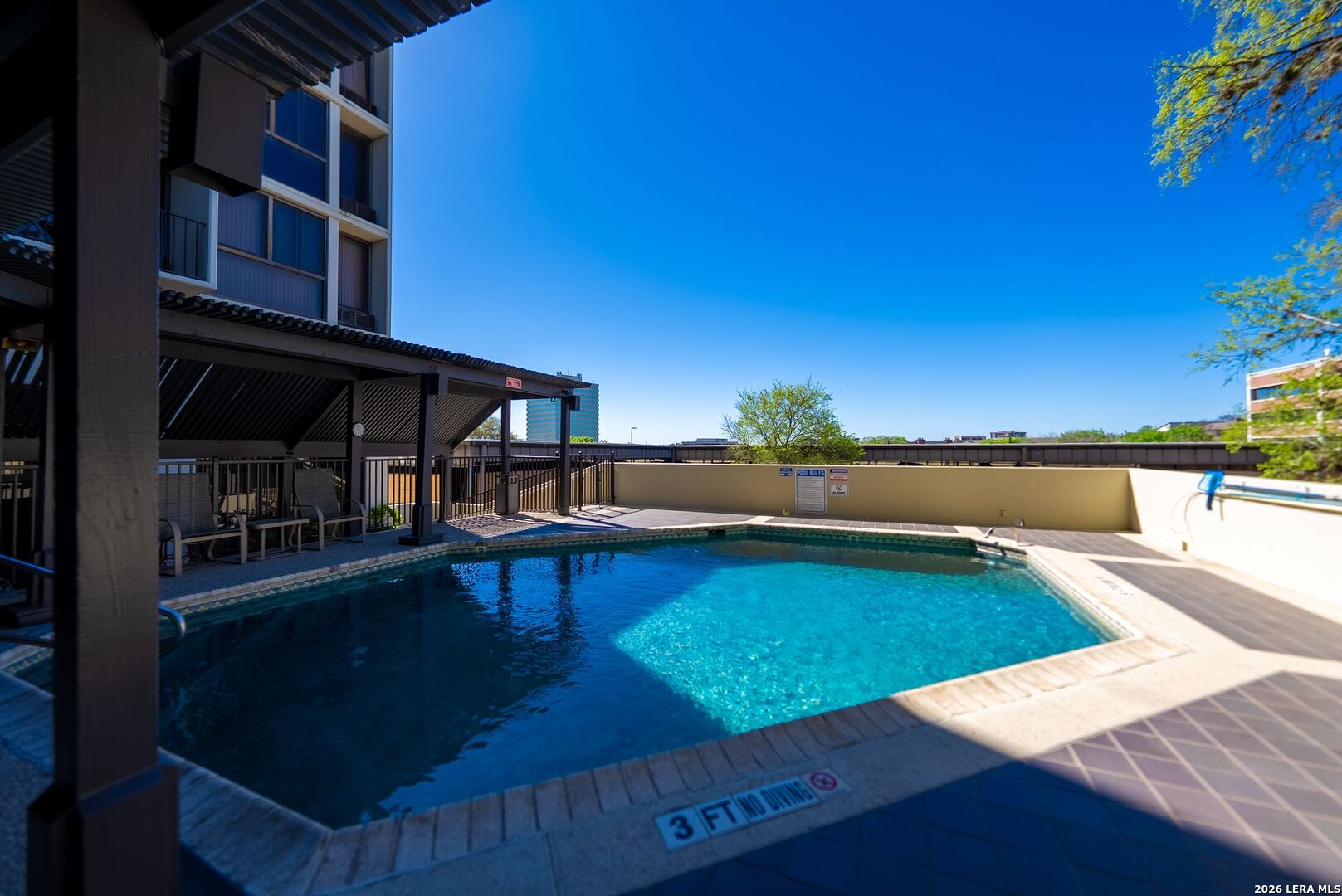 7701 Wurzbach Road, Unit 2302 San Antonio, TX 78229 - Photo 35 of 49 swimming pool view with a seating space