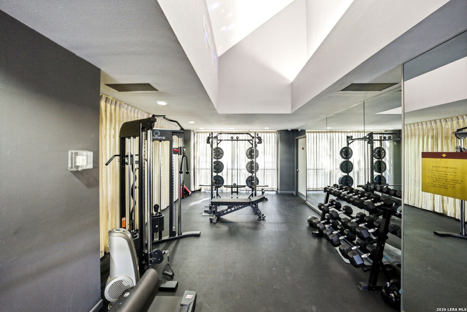 7701 Wurzbach Road, Unit 2302 San Antonio, TX 78229 - Photo 39 of 49 a view of a room with gym equipment