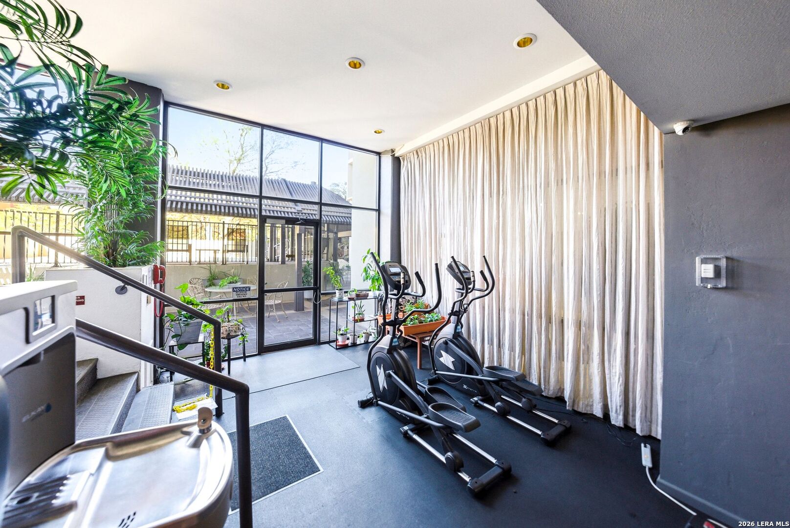 7701 Wurzbach Road, Unit 2302 San Antonio, TX 78229 - Photo 40 of 49 a view of a room with gym equipment