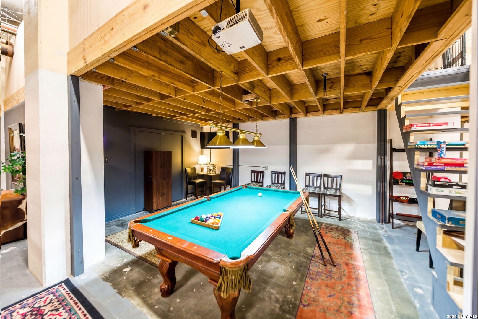 7701 Wurzbach Road, Unit 2302 San Antonio, TX 78229 - Photo 44 of 49 a room with pool table and windows