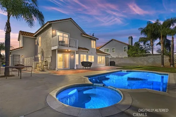 a view of a house with swimming pool