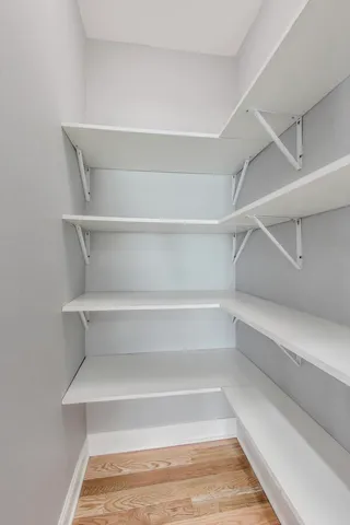 a view of a room with shelves