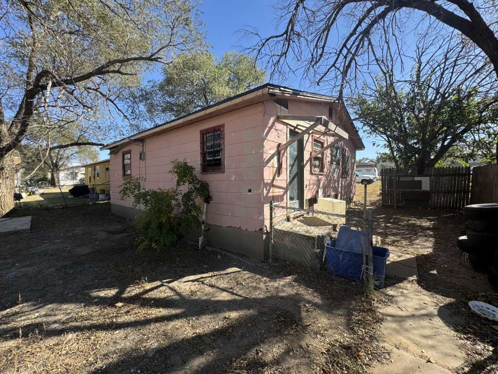 1503 East 8th Street Lubbock, TX 79403 - Photo 2 of 12 a view of a house with backyard and sitting area