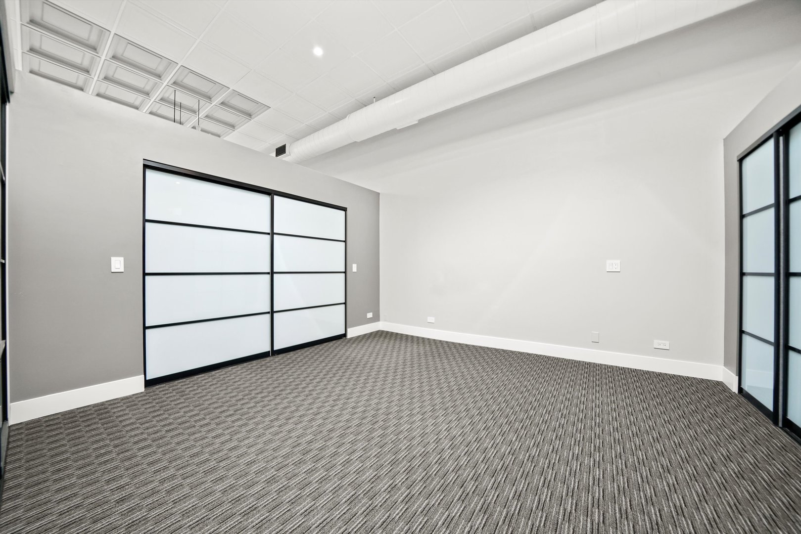 300 North Ogden Avenue, Unit 202 Chicago, IL 60607 - Photo 16 of 25 a view of a room with a wooden floor