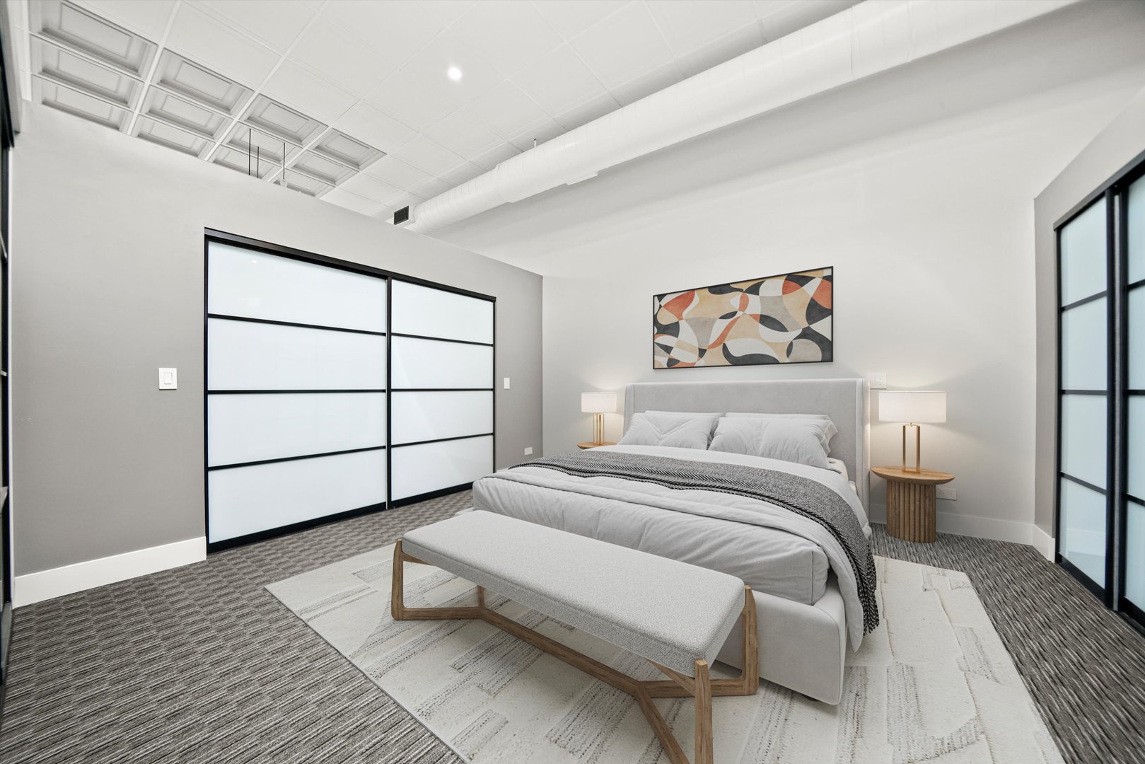 300 North Ogden Avenue, Unit 202 Chicago, IL 60607 - Photo 5 of 25 a bedroom with a bed a rug and wooden floor