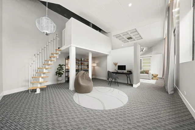 a living room with furniture a refrigerator and a fireplace