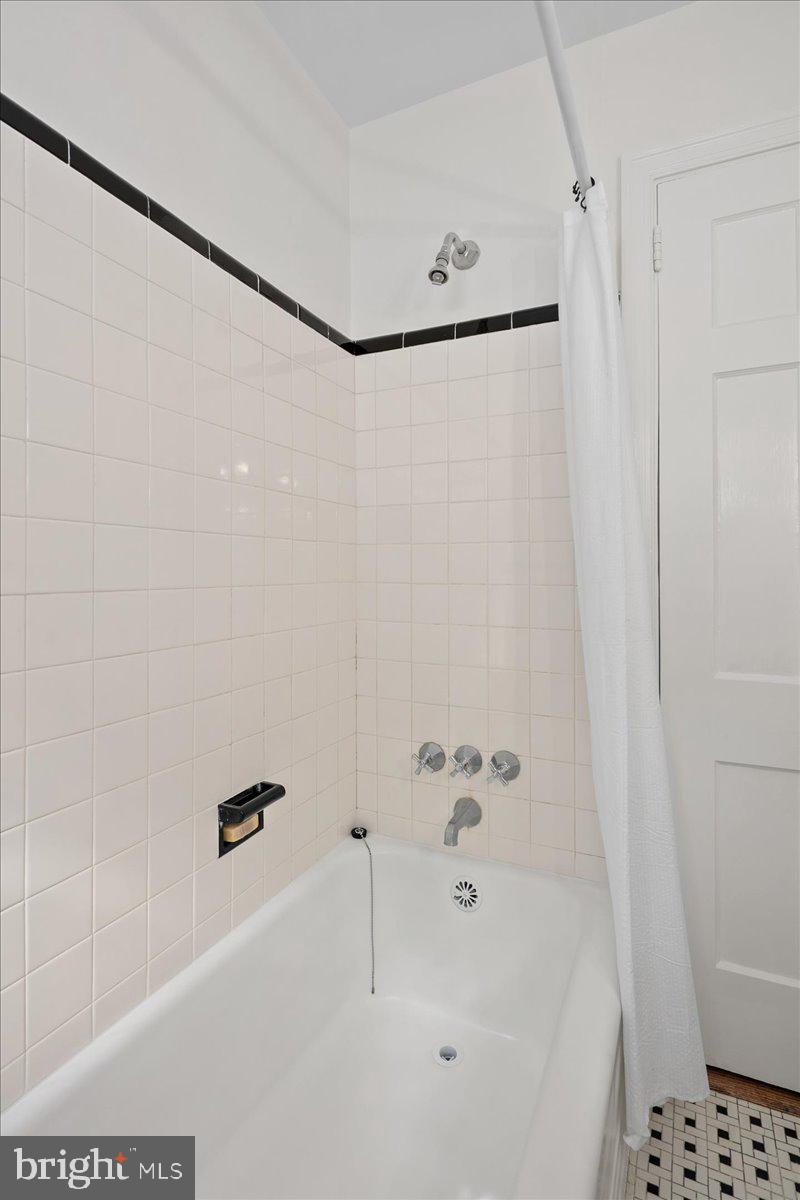 1606 North Springwood Drive Silver Spring, MD 20910 - Photo 11 of 36 a bathroom with a bathtub and shower
