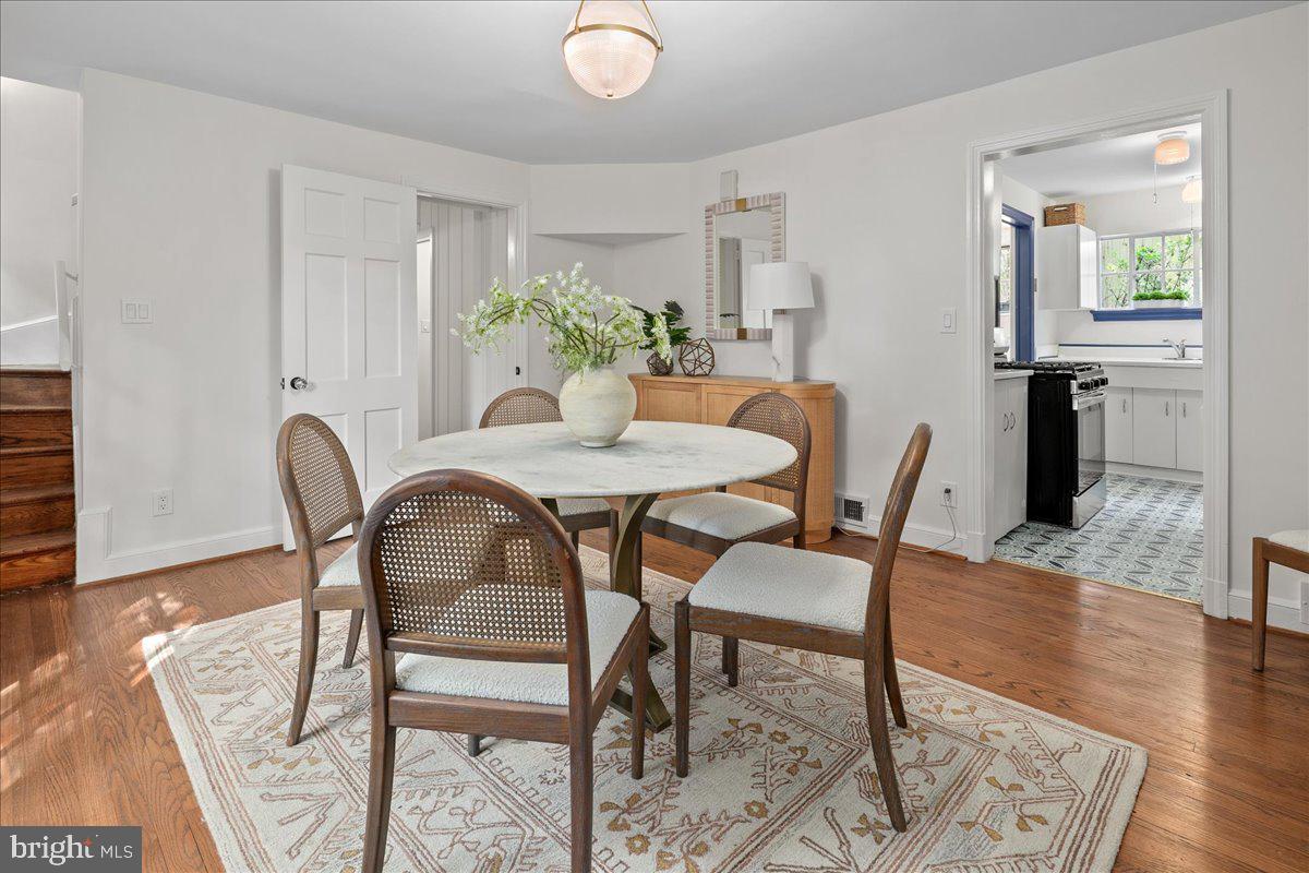 1606 North Springwood Drive Silver Spring, MD 20910 - Photo 15 of 36 a dining room with furniture and wooden floor