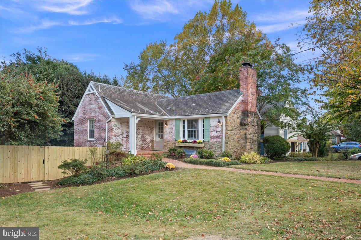1606 North Springwood Drive Silver Spring, MD 20910 - Photo 2 of 36 a front view of a house with a yard