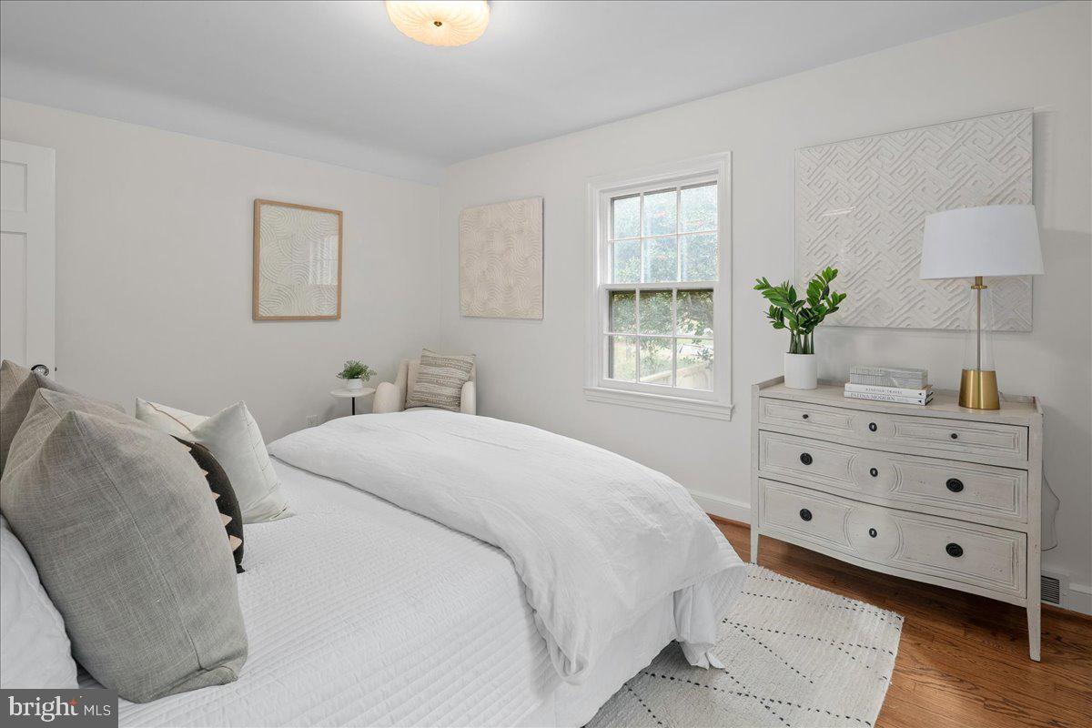 1606 North Springwood Drive Silver Spring, MD 20910 - Photo 22 of 36 a bedroom with a bed and a window