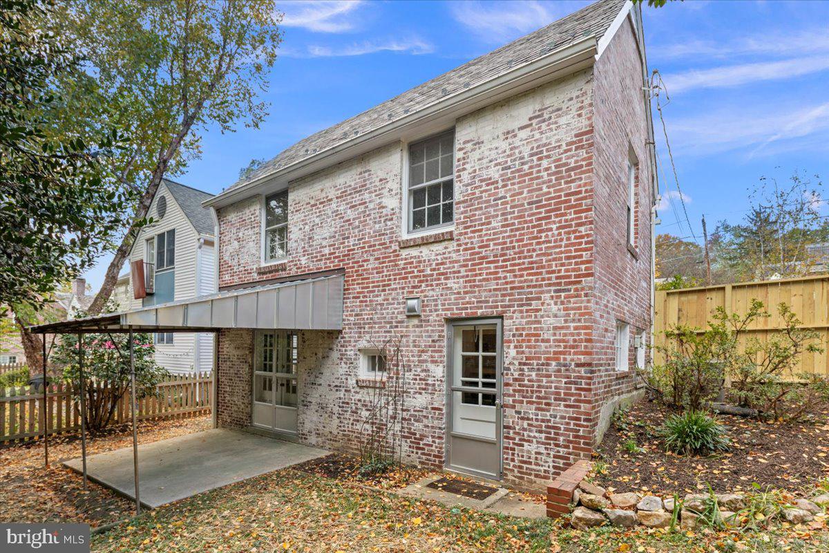 1606 North Springwood Drive Silver Spring, MD 20910 - Photo 32 of 36 a brick house with a large windows