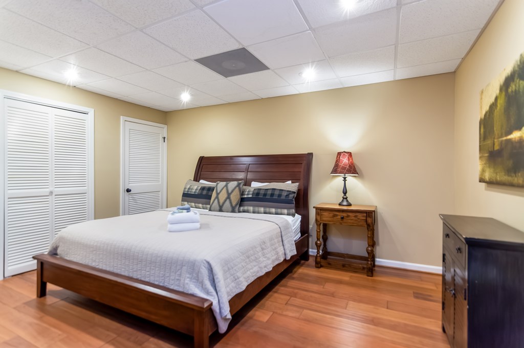 22 Waterloon Trail Morganton, GA 30560 - Photo 65 of 71 a bedroom with a bed and wooden floor