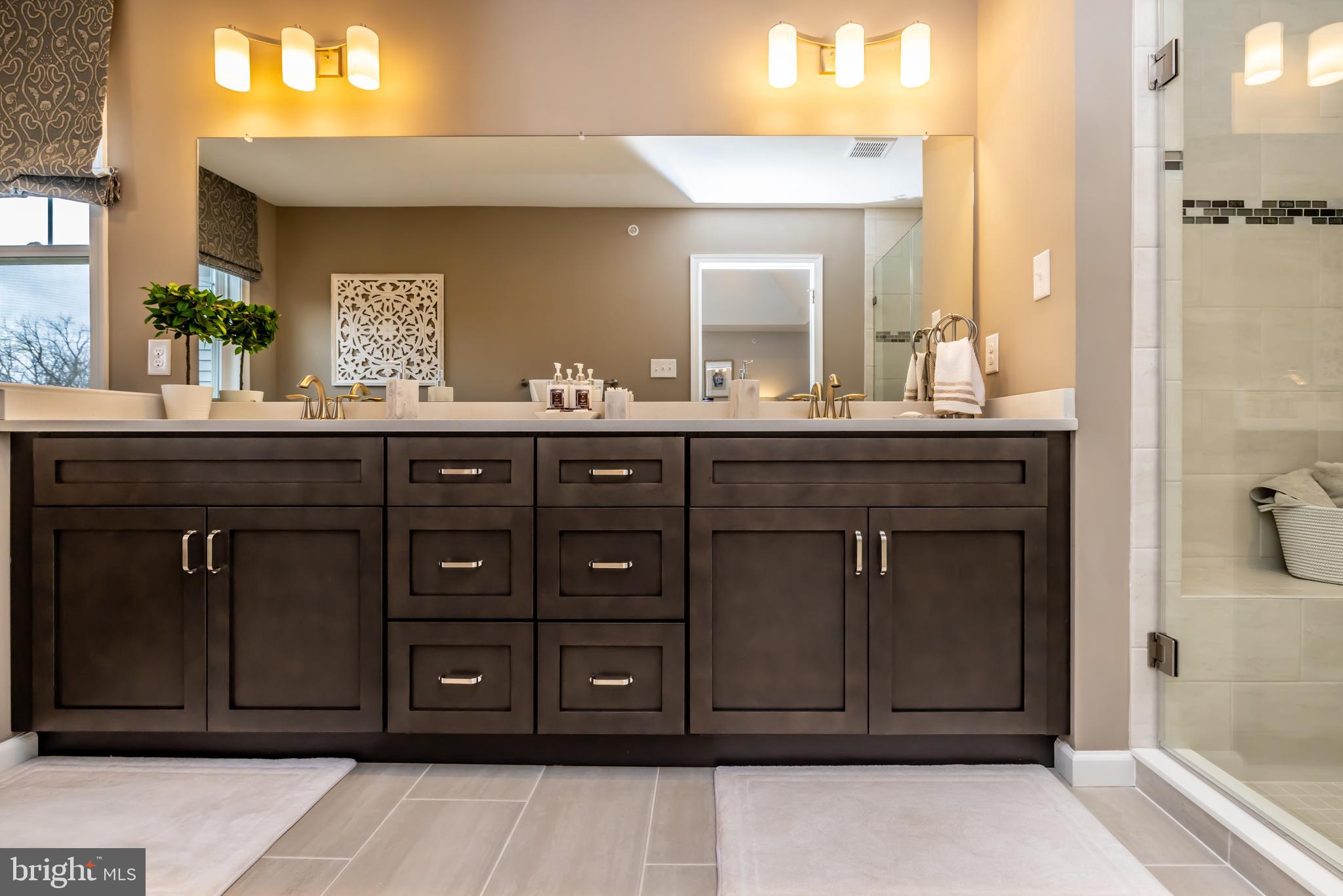 156 Bancroft Road, Unit SUTTON Kennett Square, PA 19348 - Photo 22 of 48 a bathroom with a granite countertop sink and a mirror