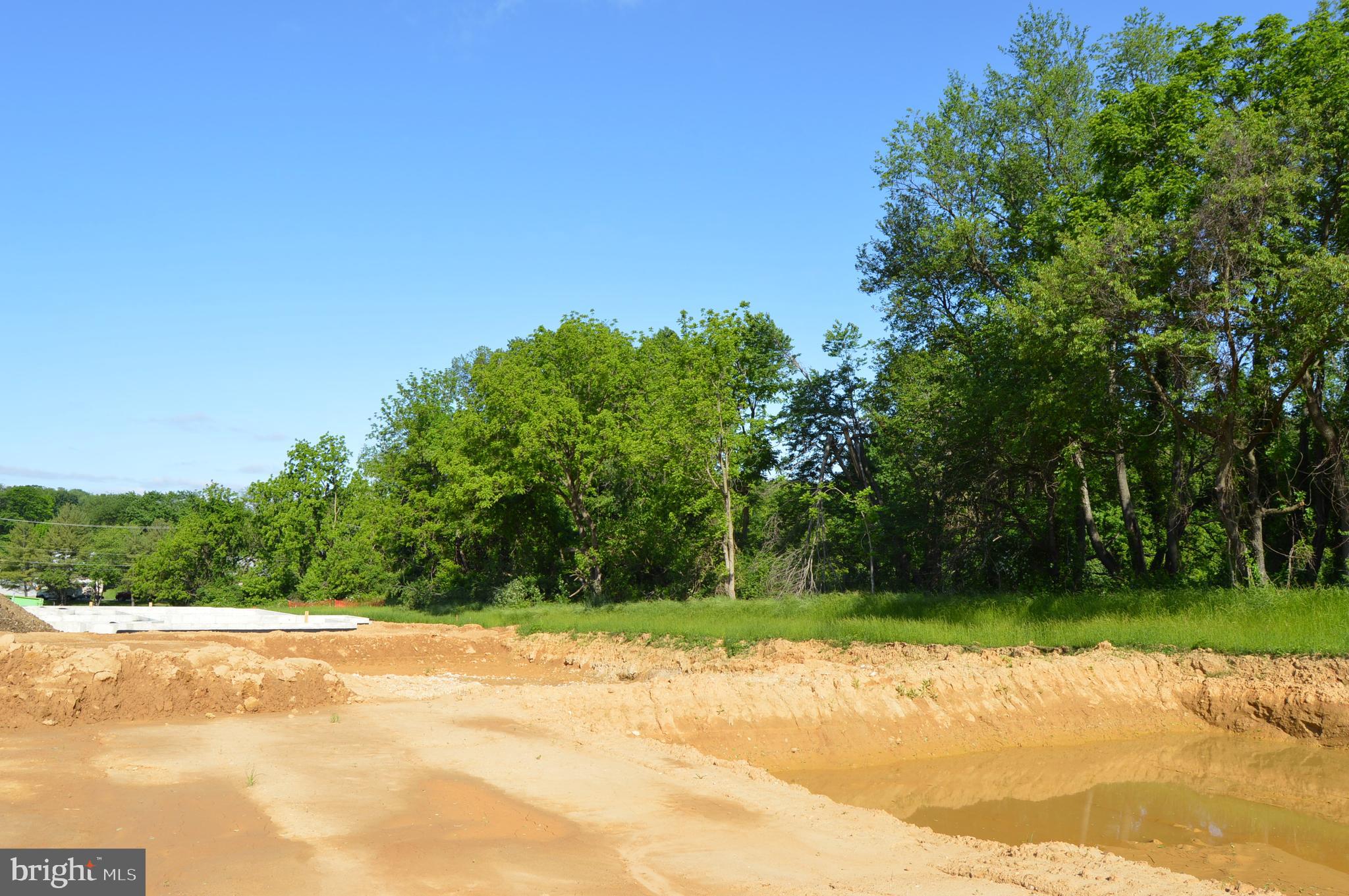 156 Bancroft Road, Unit SUTTON Kennett Square, PA 19348 - Photo 43 of 50 a view of a yard with a house in the background