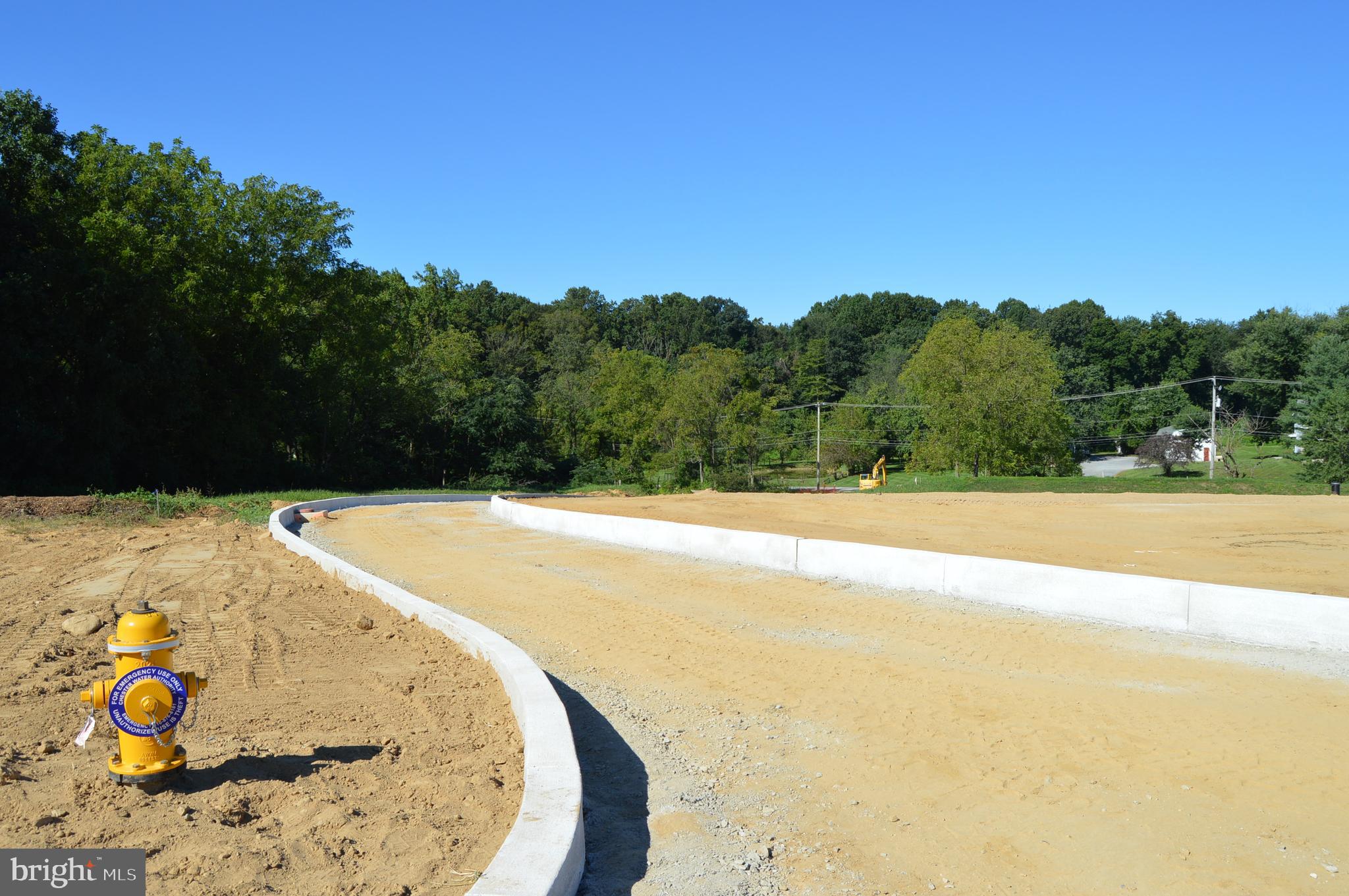 156 Bancroft Road, Unit SUTTON Kennett Square, PA 19348 - Photo 44 of 50 a view of a swimming pool with a yard