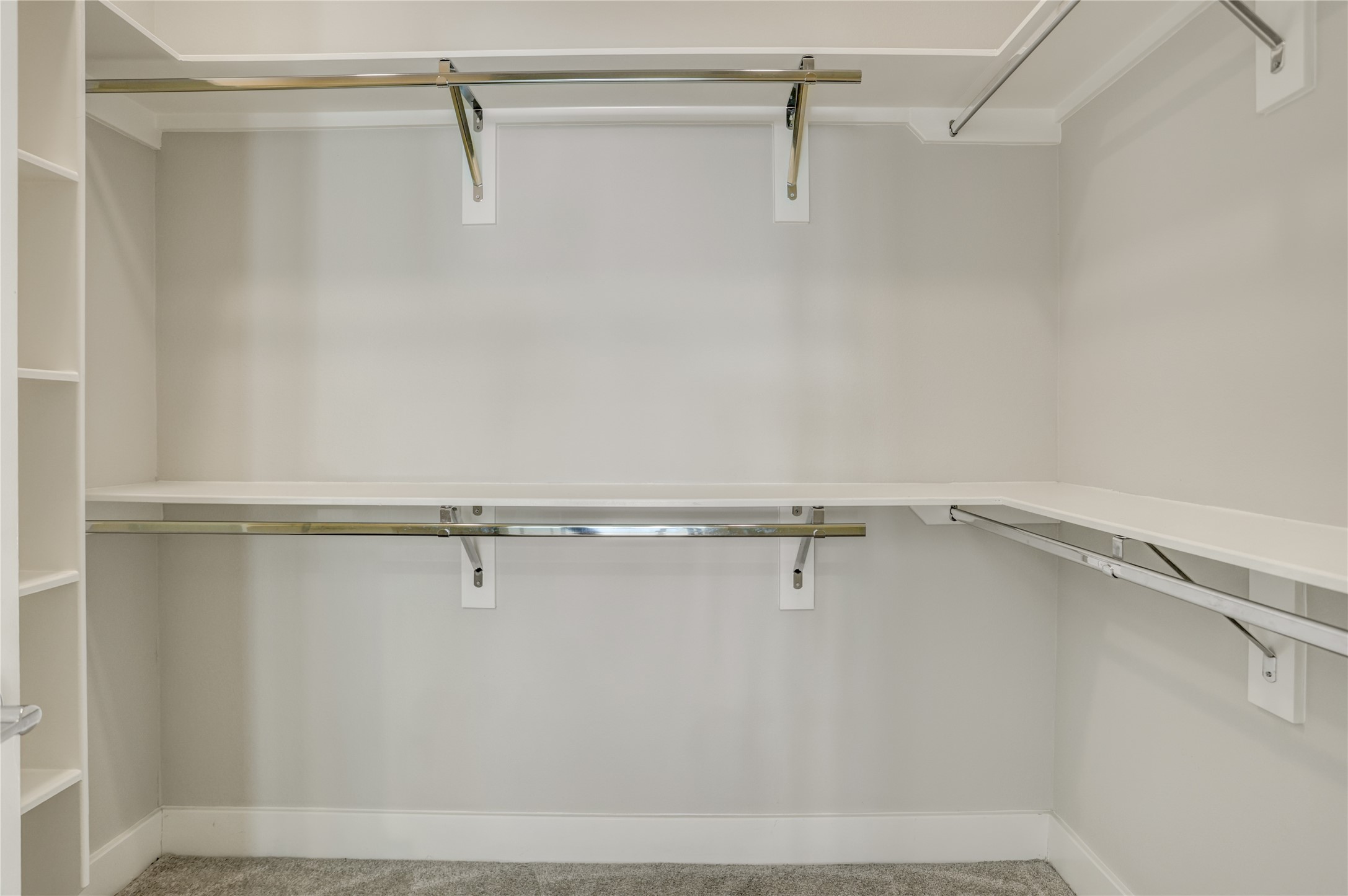 2413 Chapman Street Houston, TX 77009 - Photo 11 of 18 a view of a room with racks on the wall