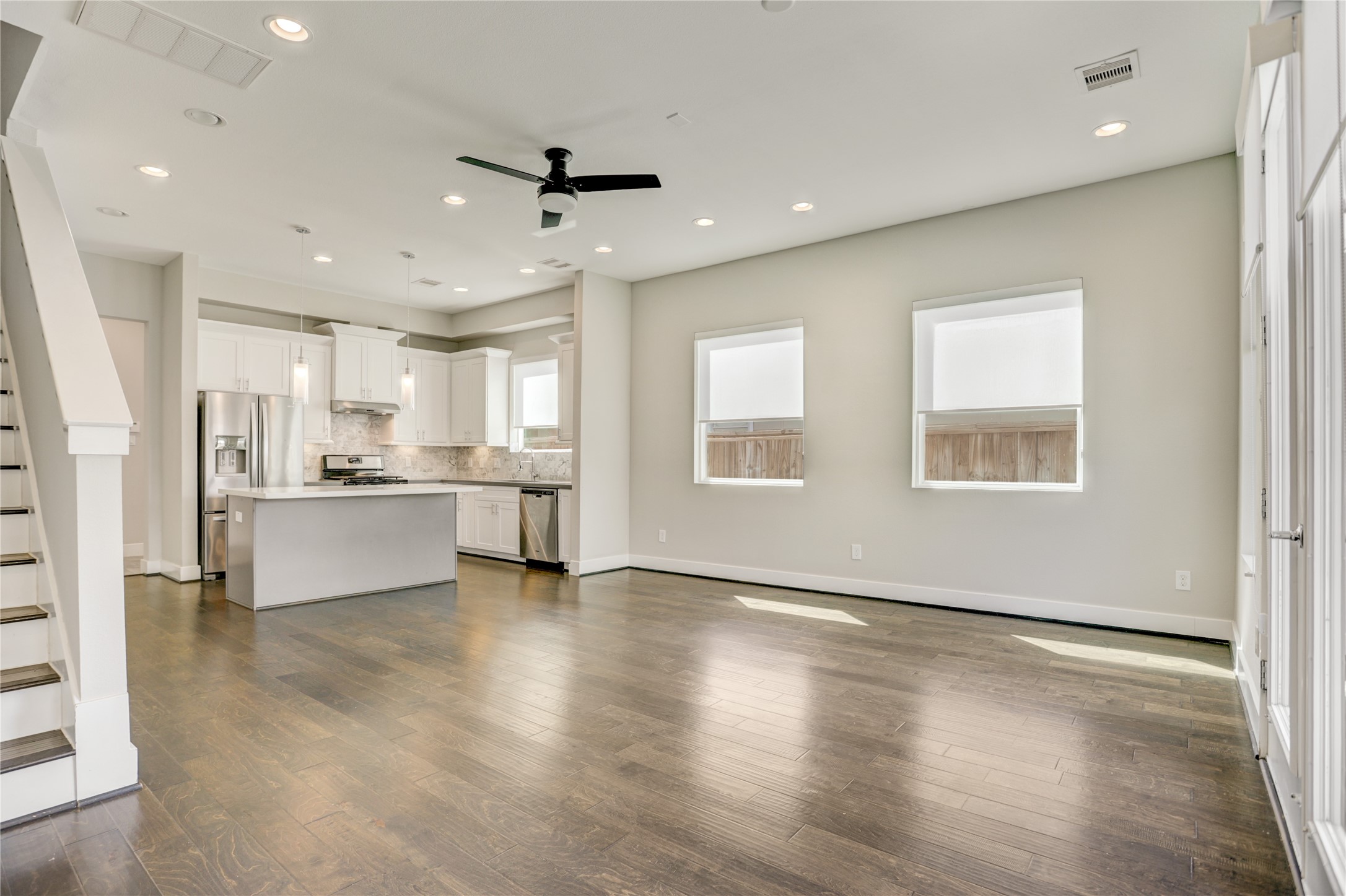 2413 Chapman Street Houston, TX 77009 - Photo 5 of 18 a view of an empty room with kitchen appliances and a window