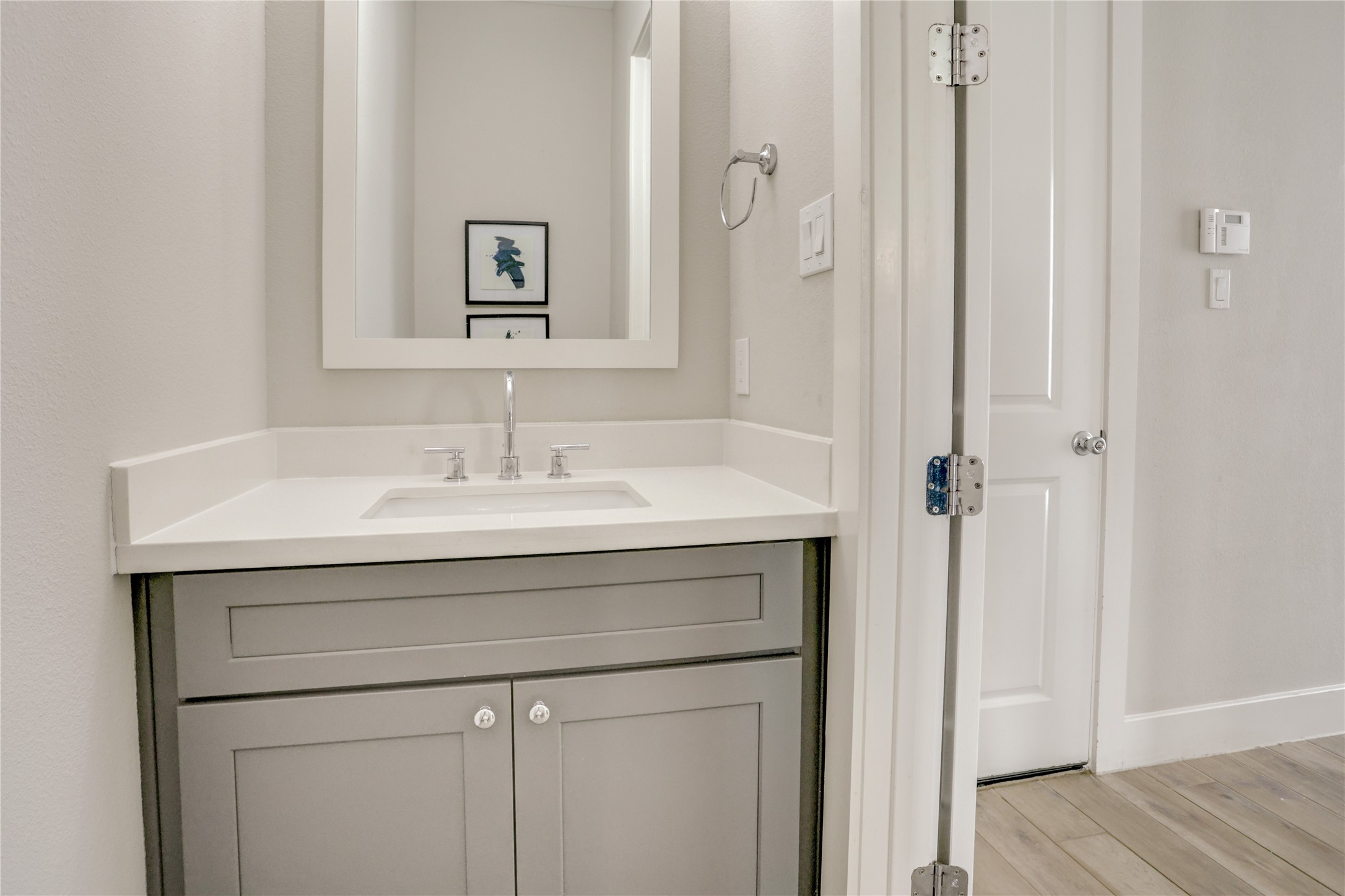 2413 Chapman Street Houston, TX 77009 - Photo 7 of 18 a sink under a bathroom mirror