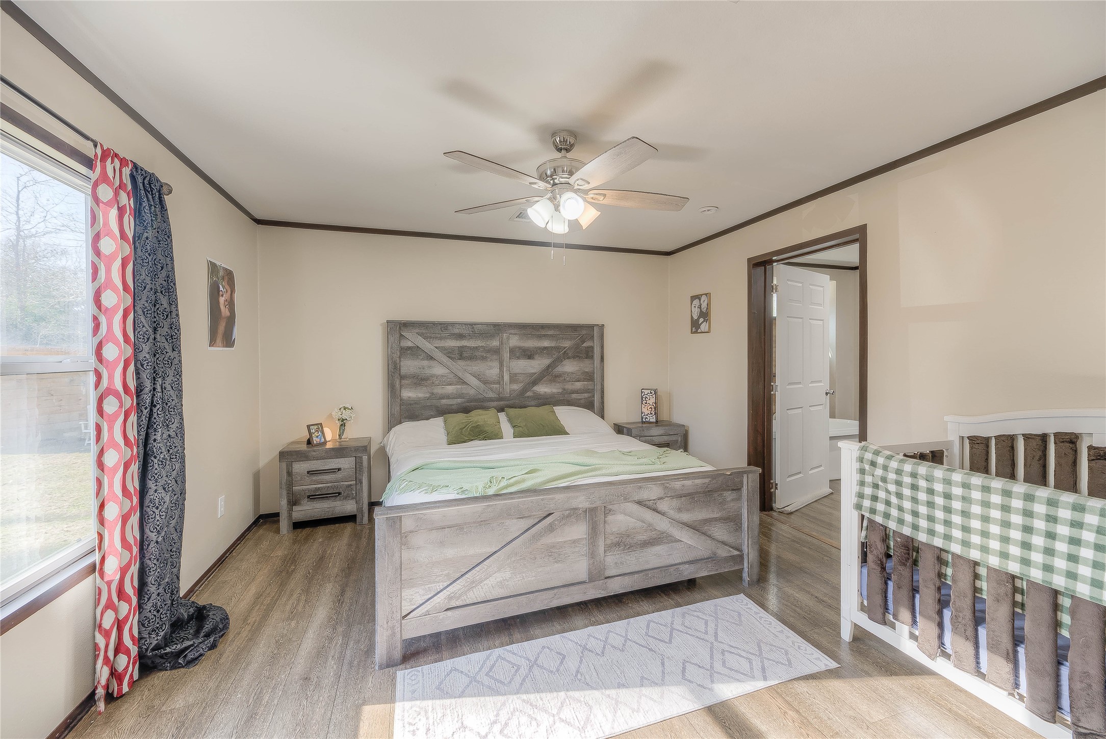 2757 East Capps Road Livingston, TX 77351 - Photo 12 of 42 Master bedroom 14x13 with walking closet.