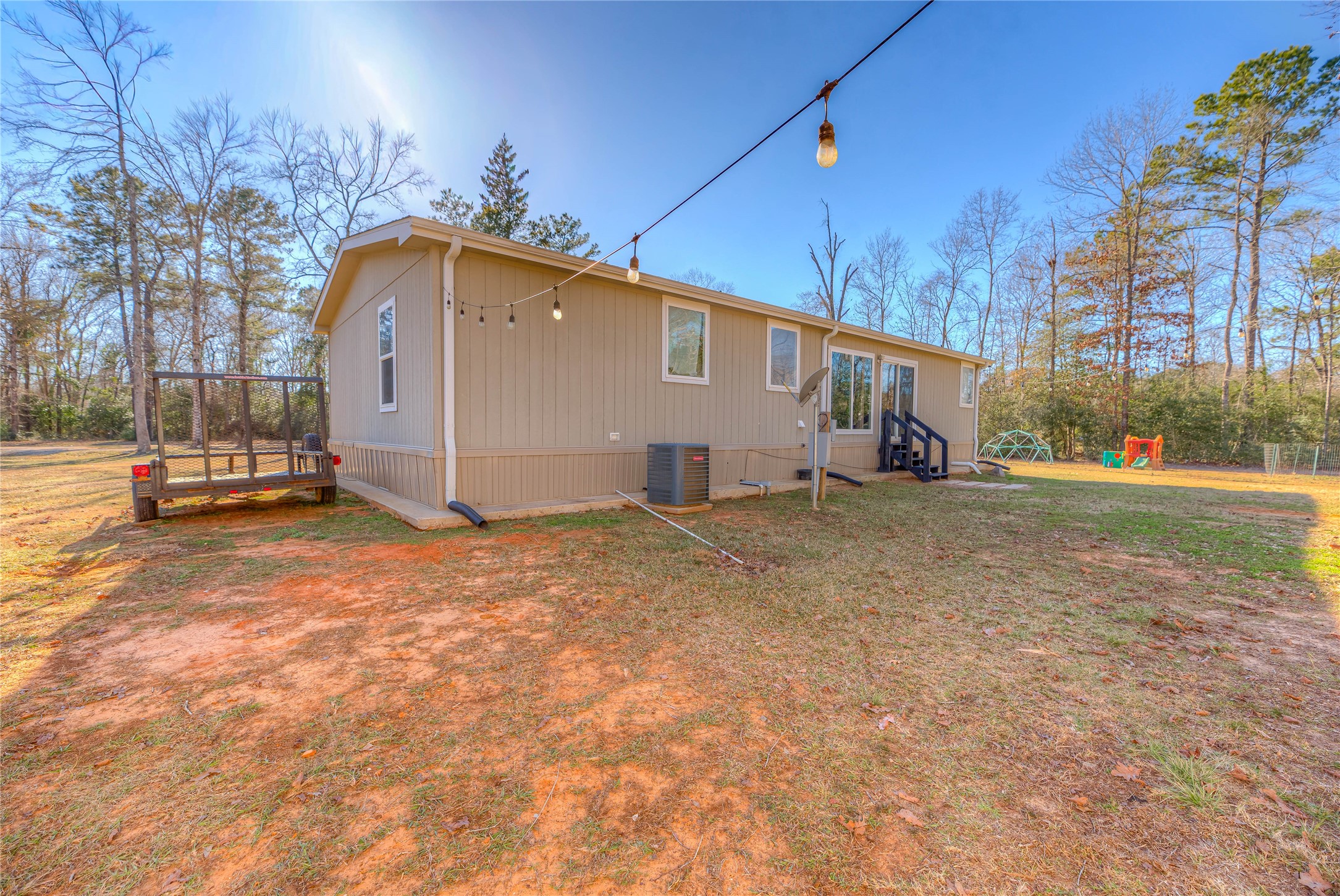 2757 East Capps Road Livingston, TX 77351 - Photo 21 of 42 View of the side yard.