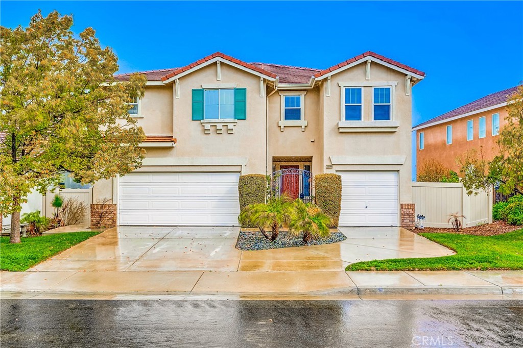 33746 Channel Street Temecula, CA 92592 - Photo 1 of 1 a front view of a house with a yard and garage