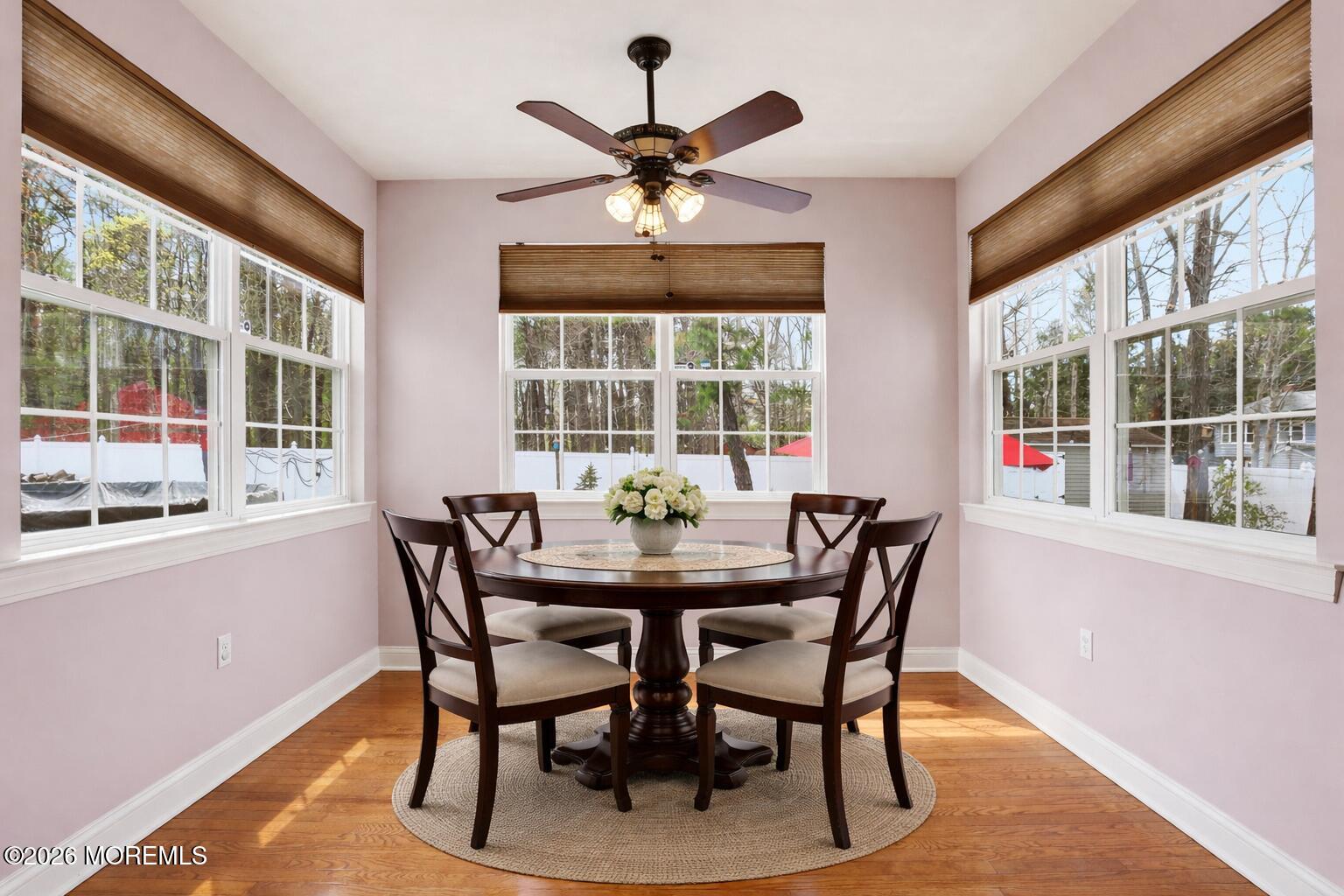 4 Firenze Road Jackson, NJ 08527 - Photo 13 of 57 a dining room with furniture a chandelier and a rug