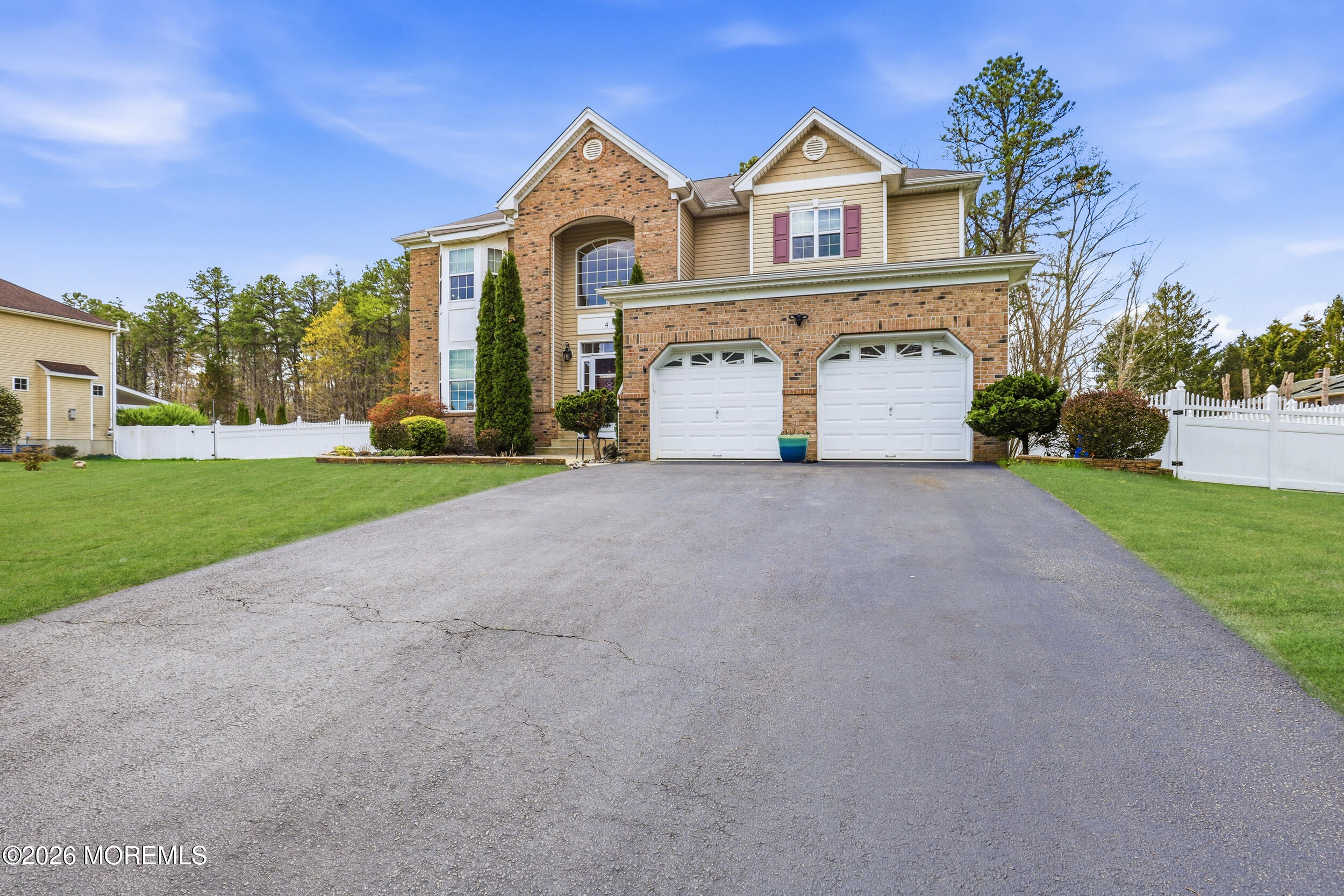 4 Firenze Road Jackson, NJ 08527 - Photo 2 of 57 a view of house with garden and tall tress