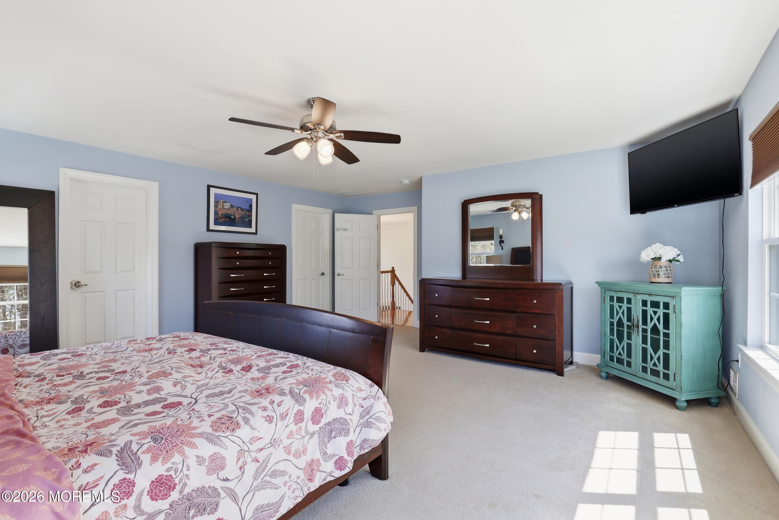 4 Firenze Road Jackson, NJ 08527 - Photo 27 of 57 a bedroom with a bed and a flat screen tv