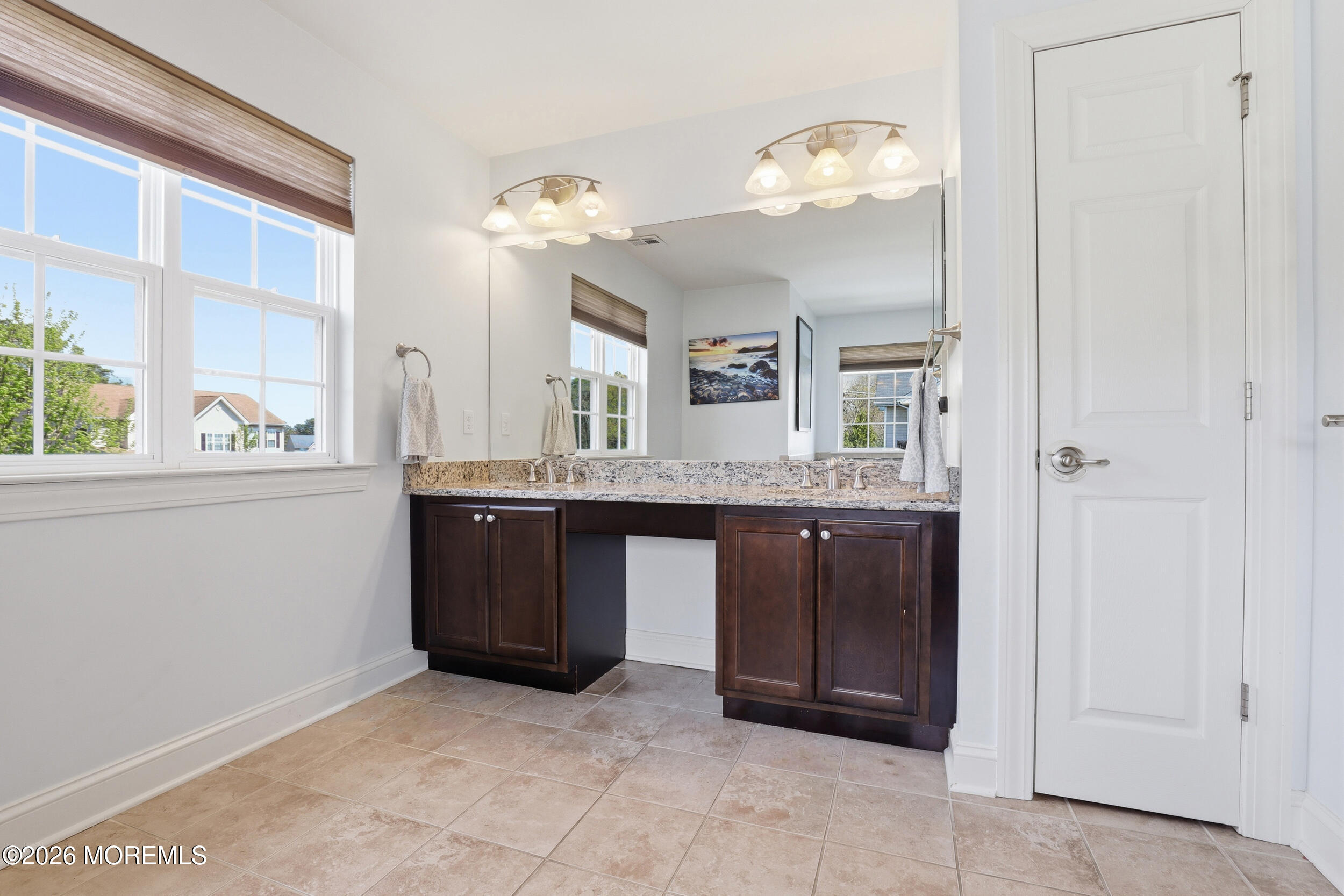 4 Firenze Road Jackson, NJ 08527 - Photo 30 of 57 a bathroom with a granite countertop sink a mirror and a vanity