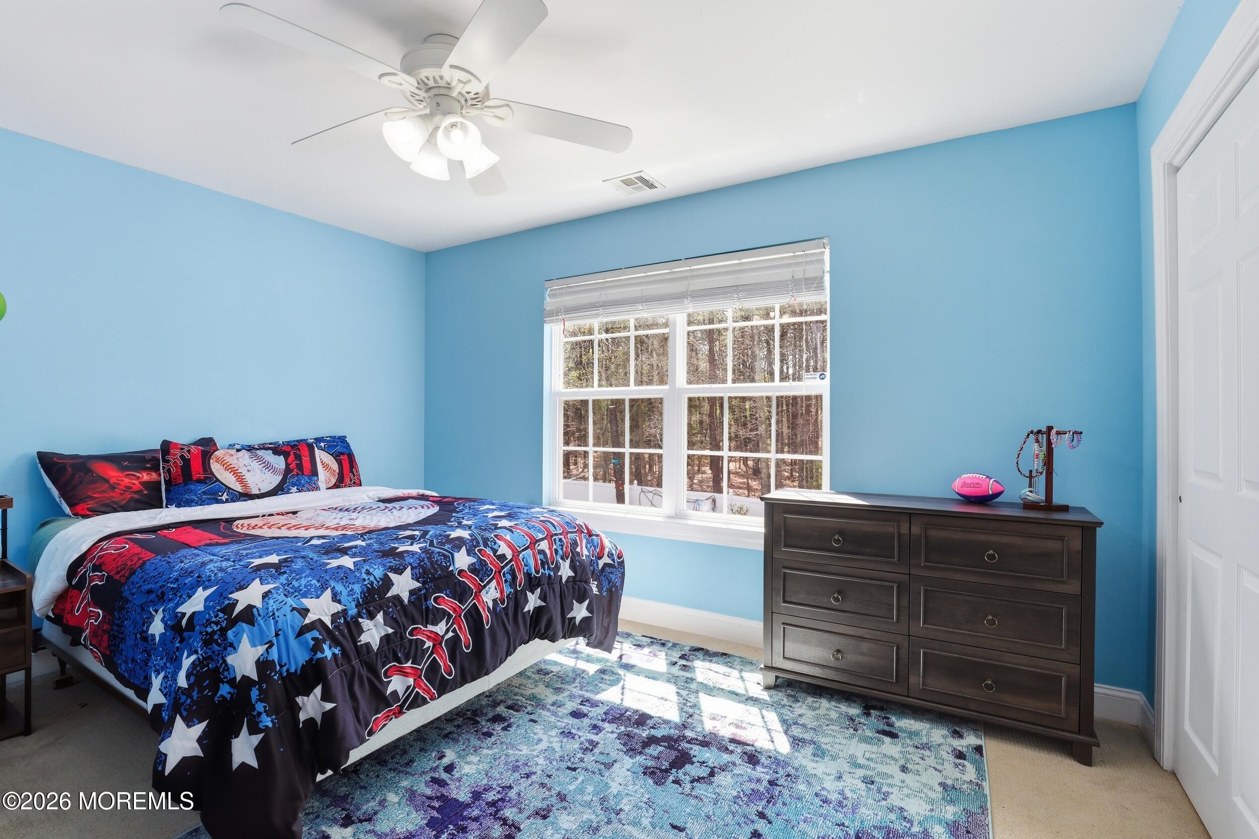 4 Firenze Road Jackson, NJ 08527 - Photo 33 of 57 a bedroom with a bed and a dresser