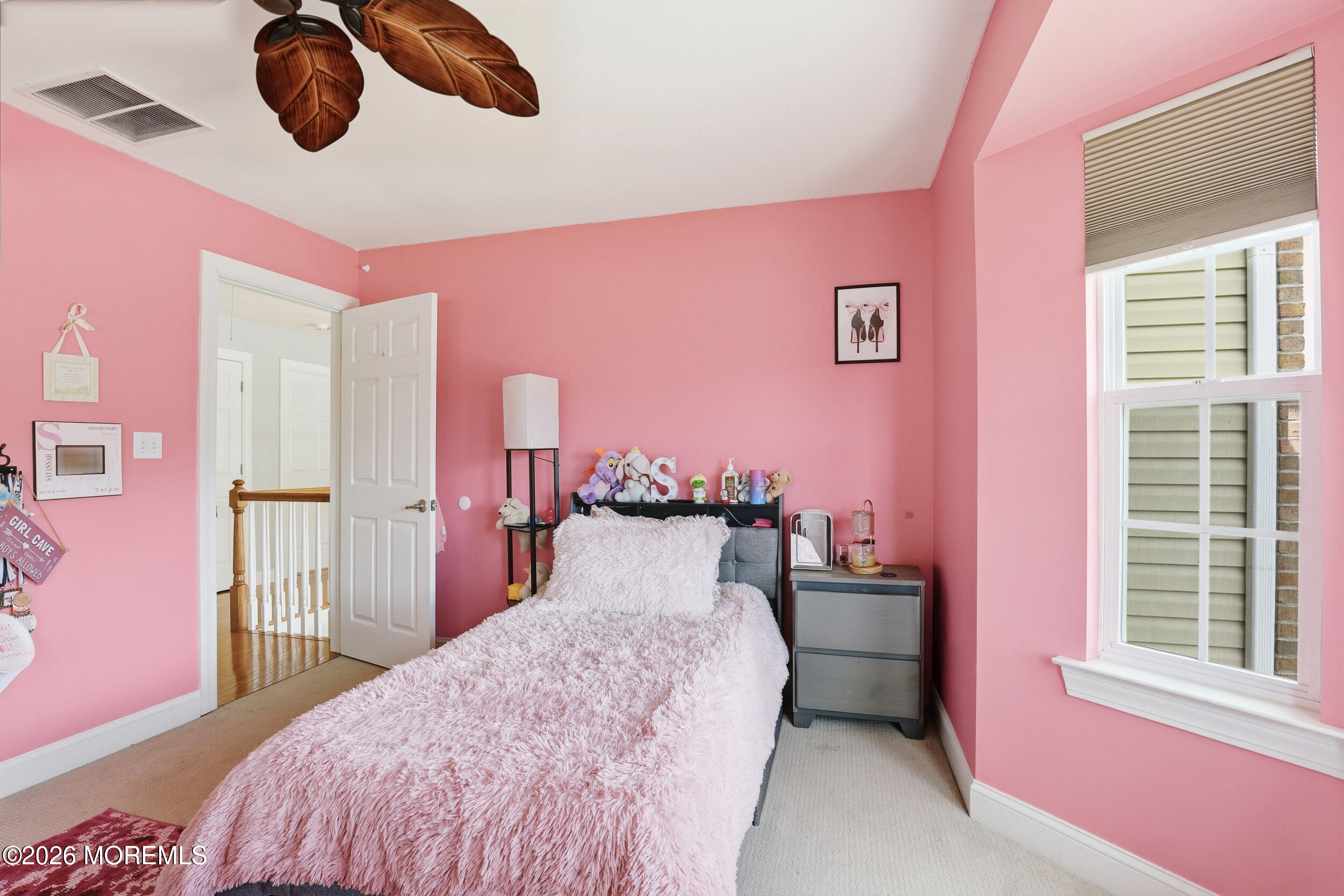 4 Firenze Road Jackson, NJ 08527 - Photo 36 of 57 a bedroom with a bed and wooden floor