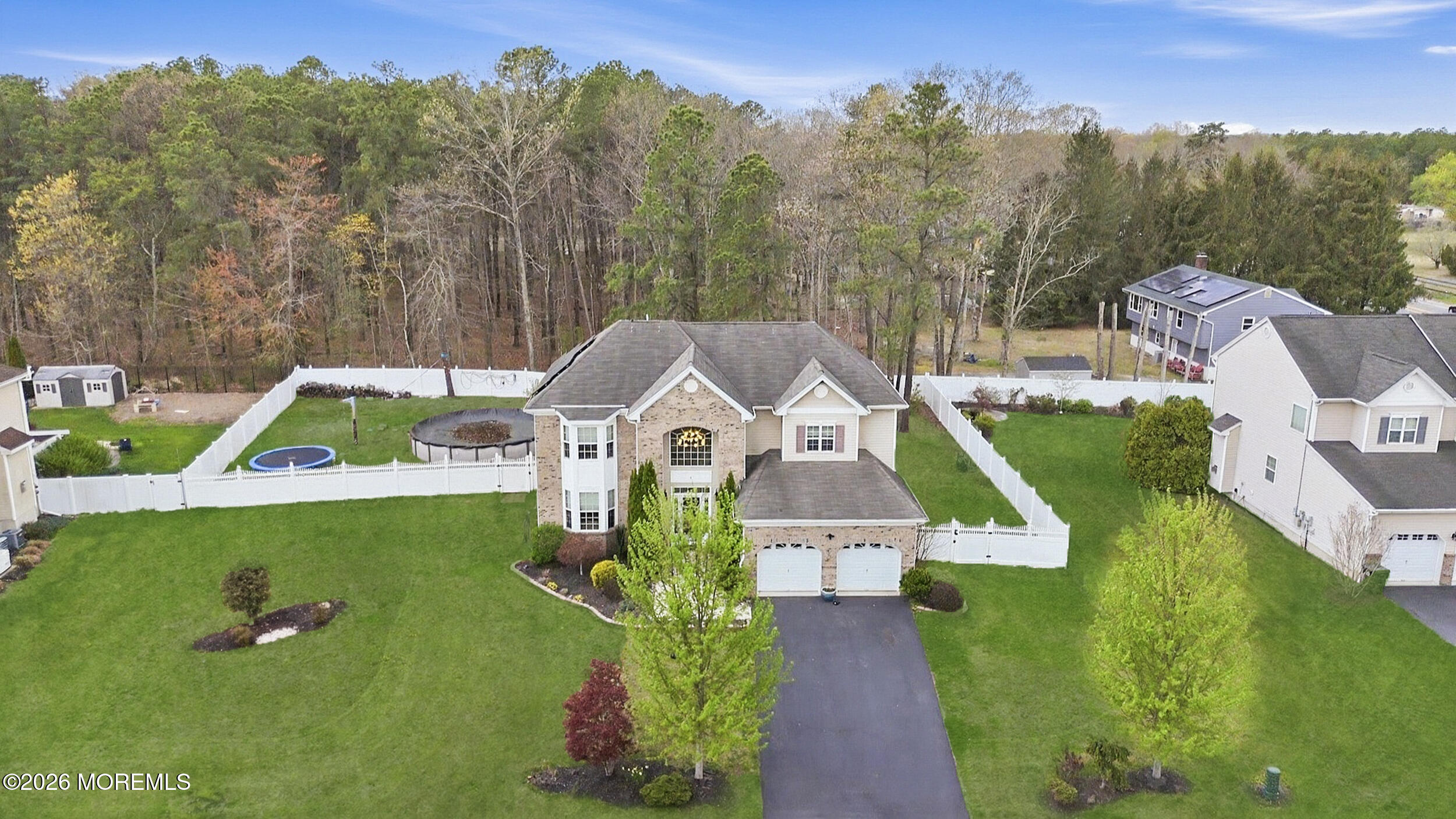4 Firenze Road Jackson, NJ 08527 - Photo 45 of 57 an aerial view of a house with a big yard