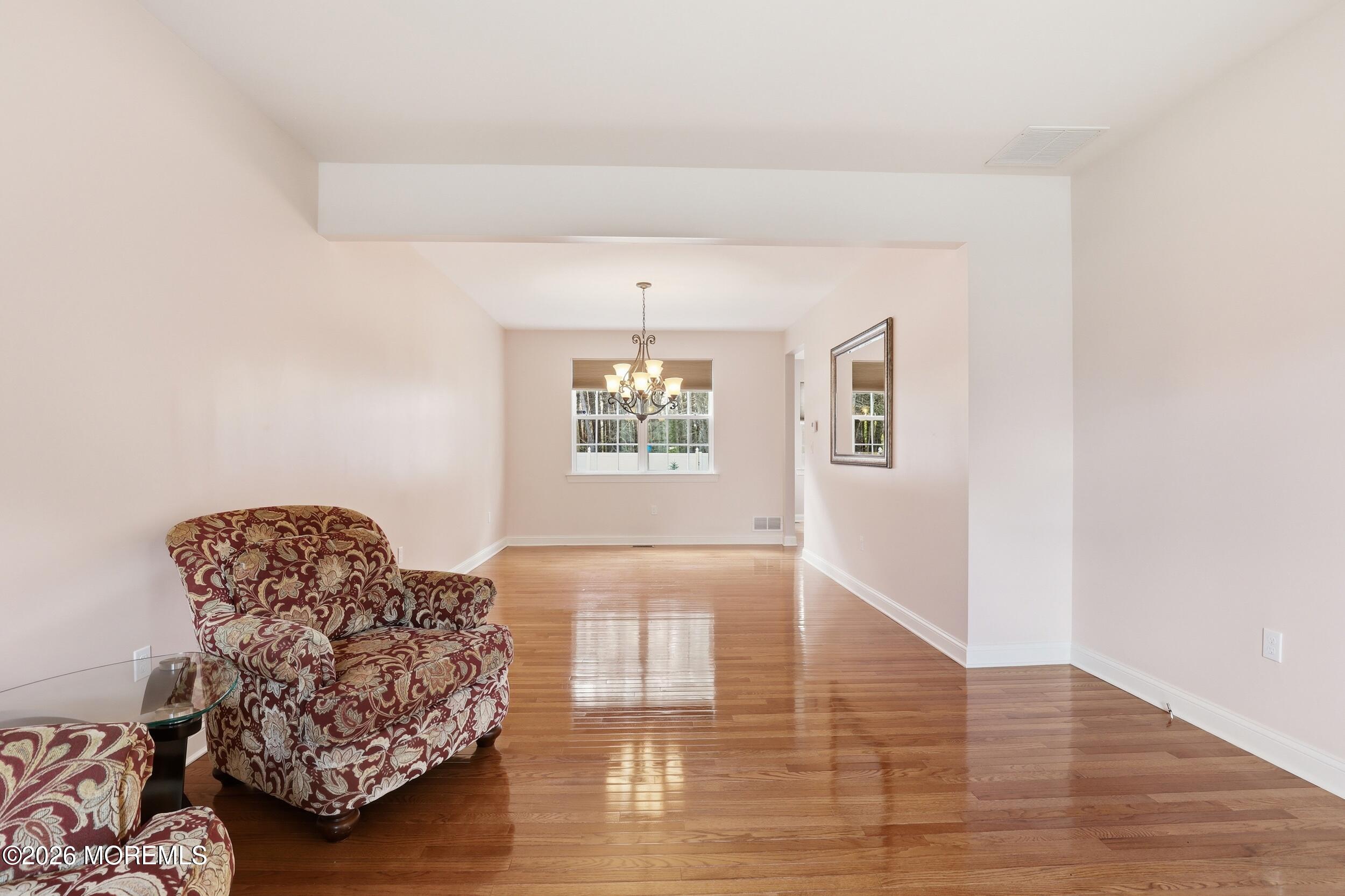 4 Firenze Road Jackson, NJ 08527 - Photo 8 of 57 a living room with furniture and a window