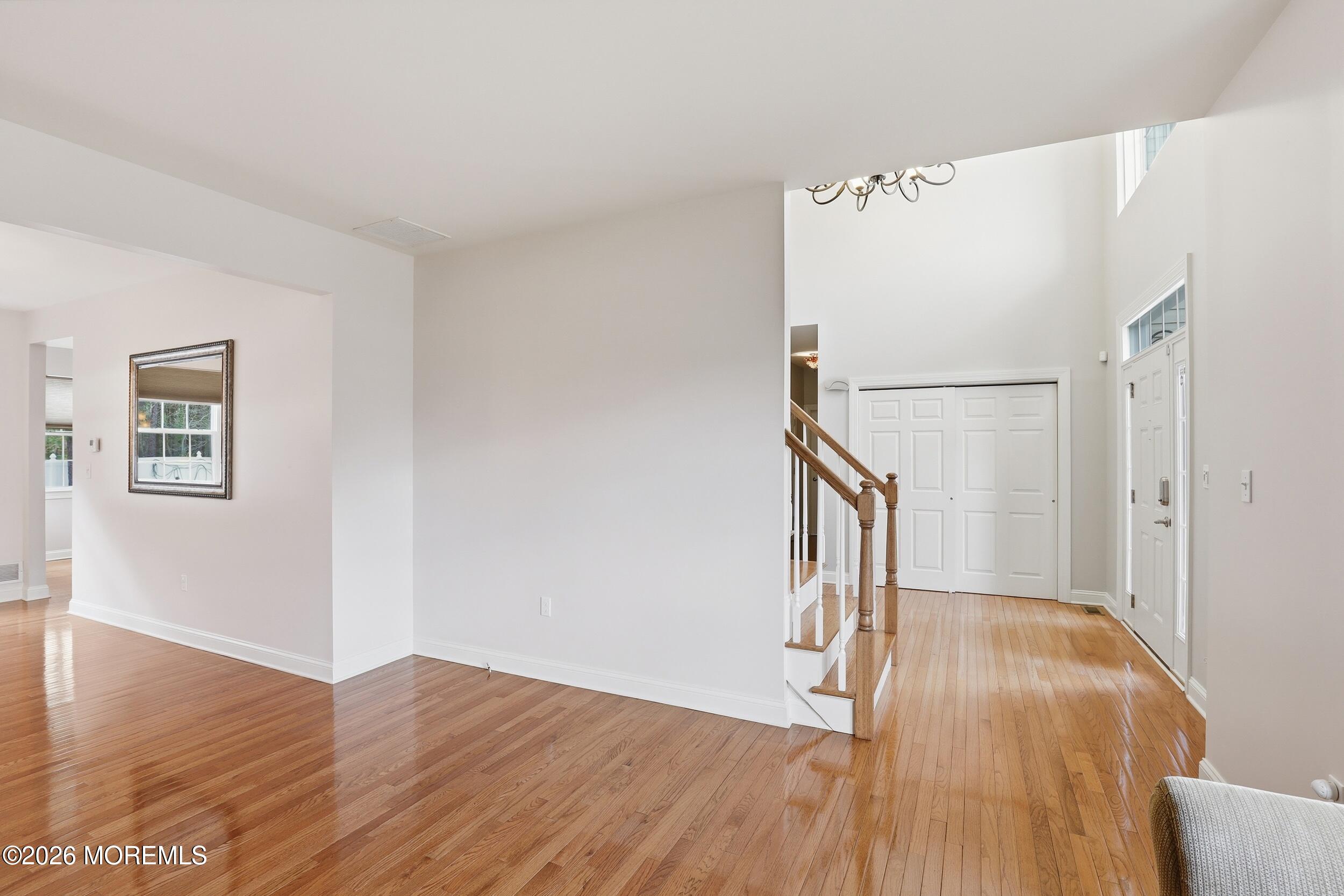 4 Firenze Road Jackson, NJ 08527 - Photo 9 of 57 a view of empty room with wooden floor and fan
