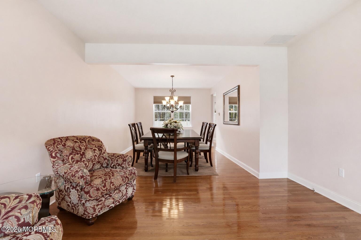 4 Firenze Road Jackson, NJ 08527 - Photo 10 of 57 a dining room with furniture and wooden floor