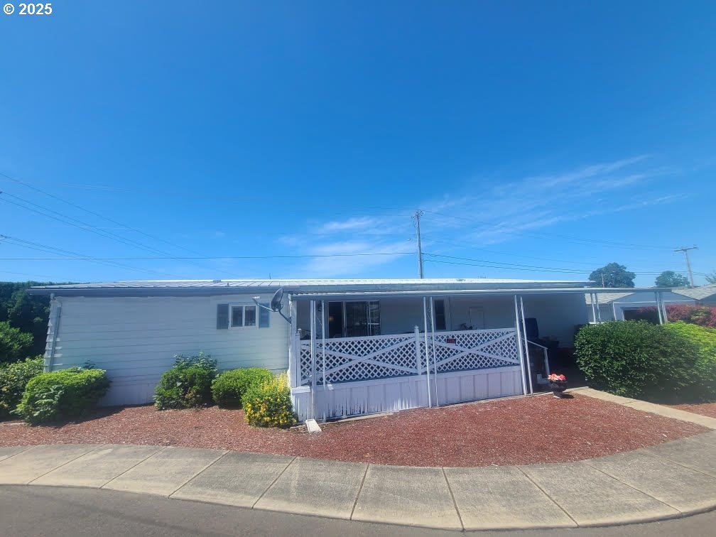 a view of a backyard of the house