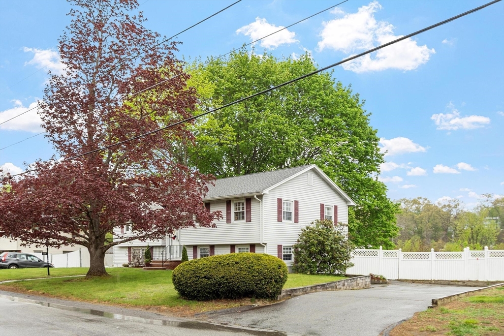 134 River Road Lowell, MA 01852 - Photo 2 of 36 a view of house with a yard