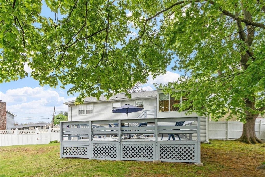 134 River Road Lowell, MA 01852 - Photo 33 of 36 a view of house with a yard