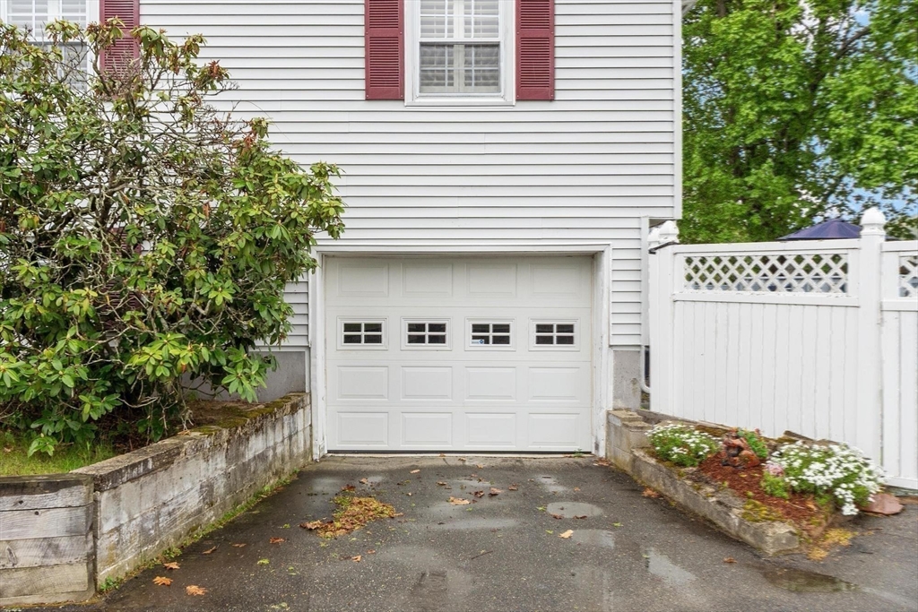 134 River Road Lowell, MA 01852 - Photo 36 of 36 a view of a house with a garage