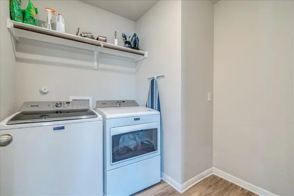 a utility room with dryer and washer