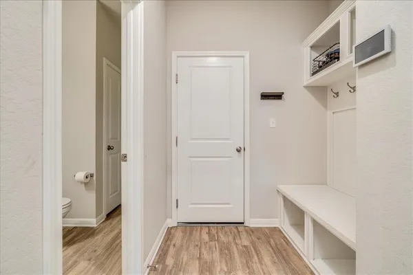 a view of bathroom with a sink and mirror