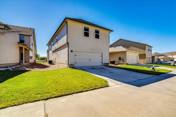 a house view with a outdoor space