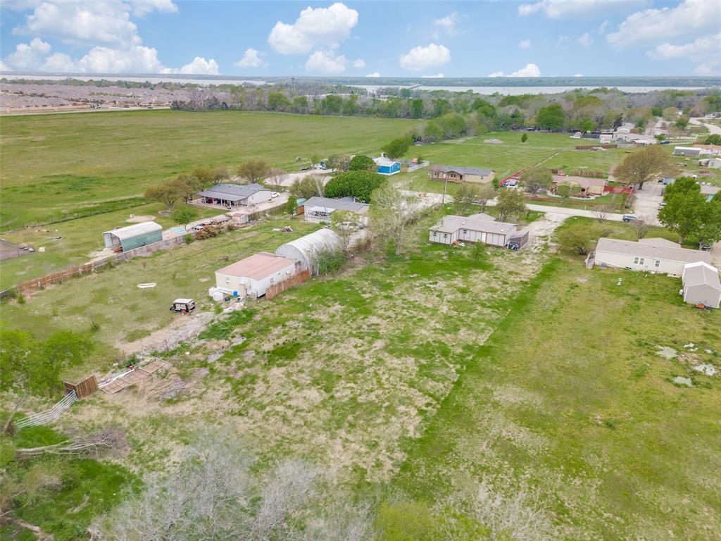 9695 Olive Street Princeton, TX 75407 - Photo 22 of 23 Birds eye view of property featuring a rural view