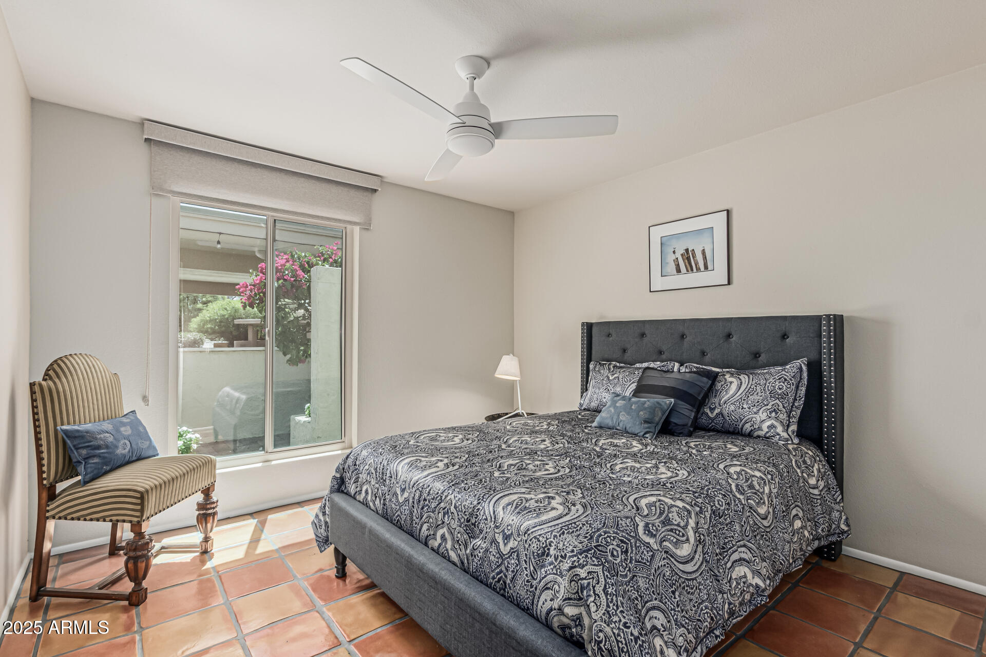 18718 East Rio Lane Rio Verde, AZ 85263 - Photo 23 of 59 a bedroom with a large bed and a couch
