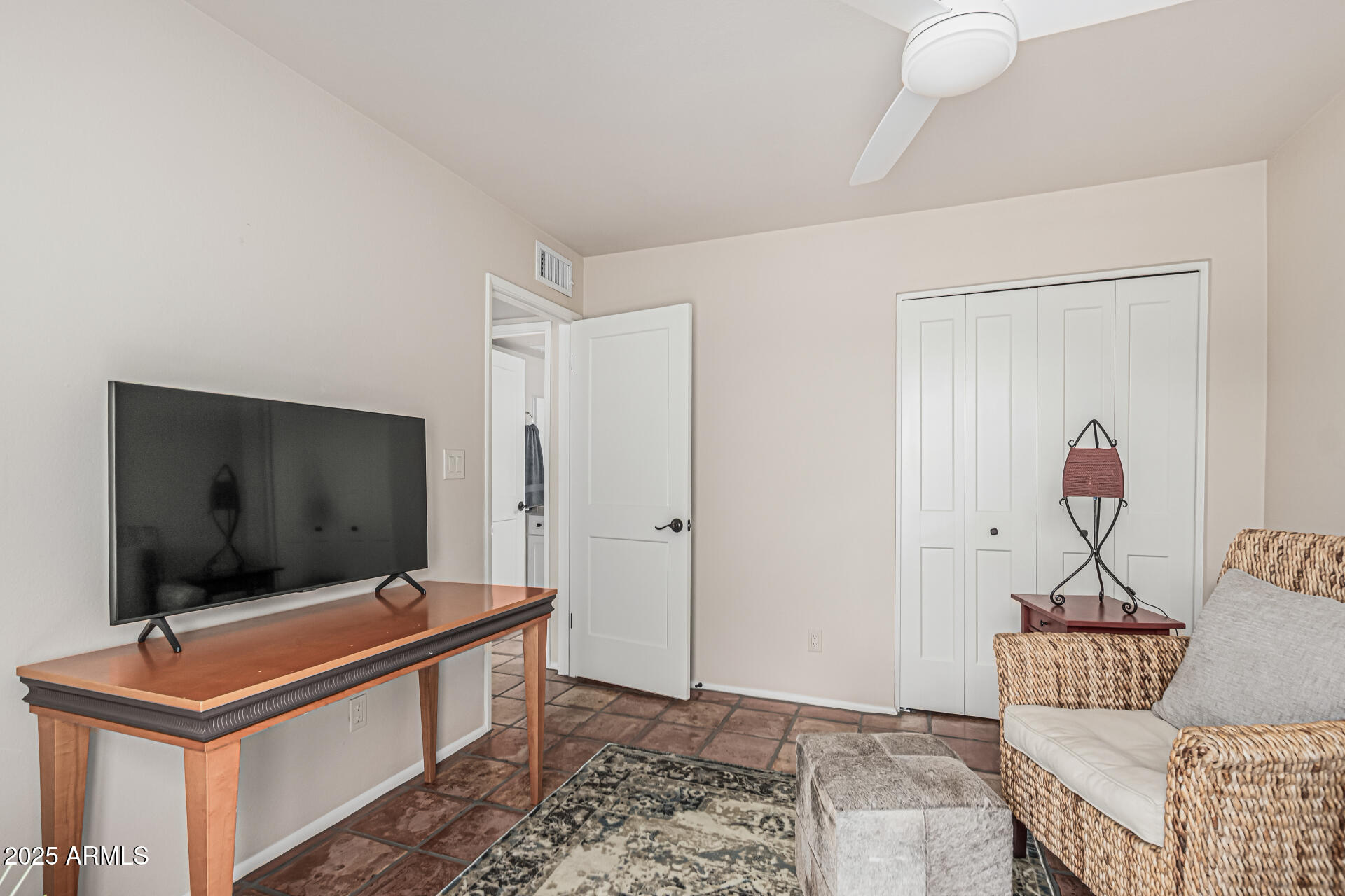 18718 East Rio Lane Rio Verde, AZ 85263 - Photo 27 of 59 a living room with furniture and a flat screen tv