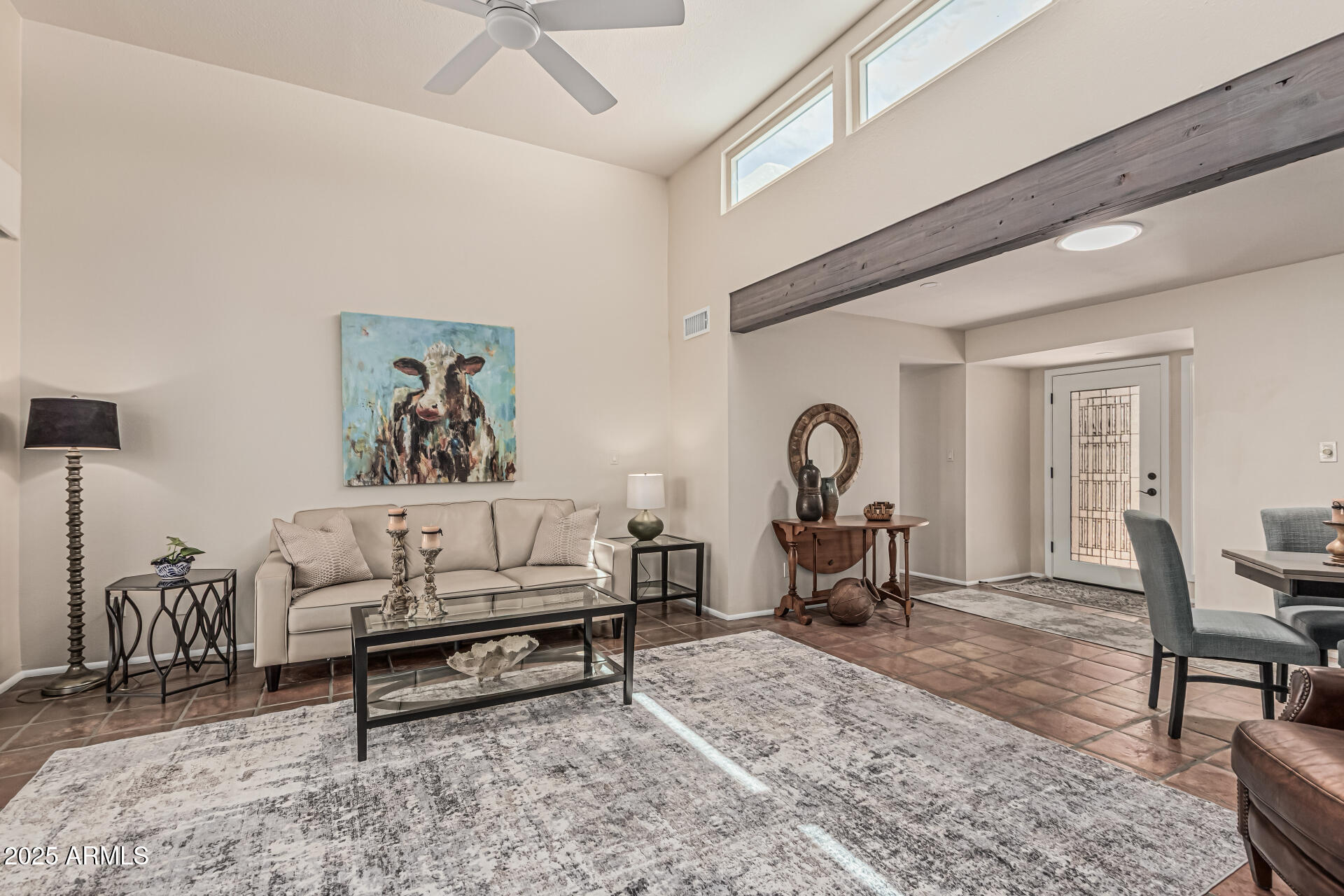 18718 East Rio Lane Rio Verde, AZ 85263 - Photo 3 of 59 a living room with furniture a rug and a table