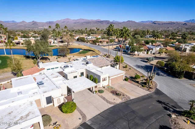 a view of a city with lawn chairs